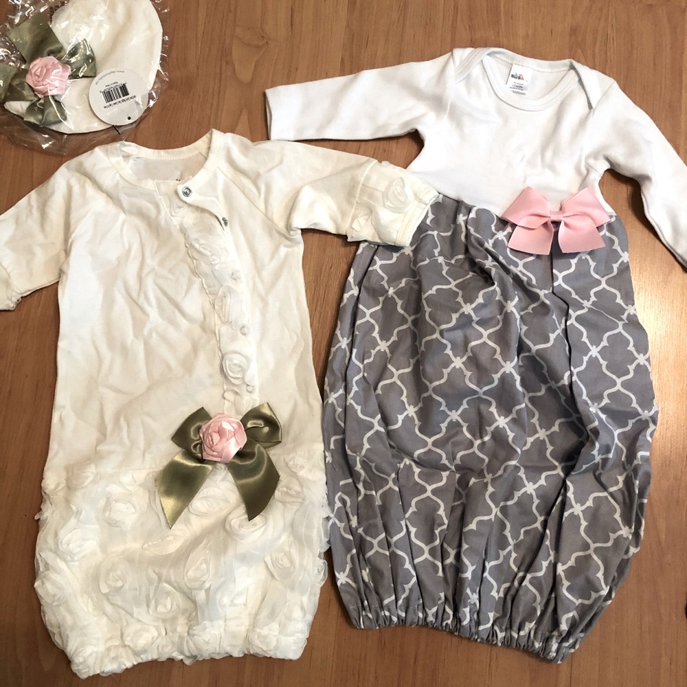 2 newborn layettes or nightgowns. Brand new, have been stored in a tote.
